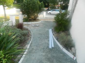 Réalisation coffrages allée piétonne