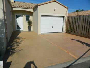 Devant de garage en béton vendée