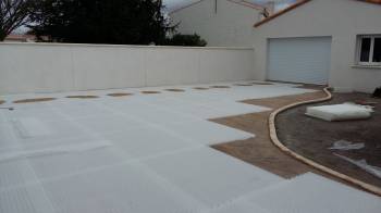 Pose de stabilisateur de graviers (REVASOL)