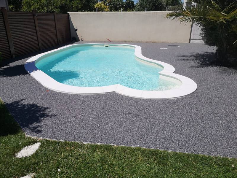 APRES (Application de la moquette de pierre REVASTONE) REVASOL