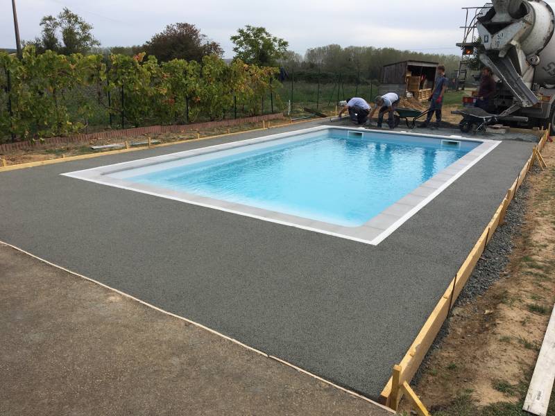 Béton drainant tour de piscine Reorthe